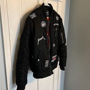 Men’s black jacket with patches
